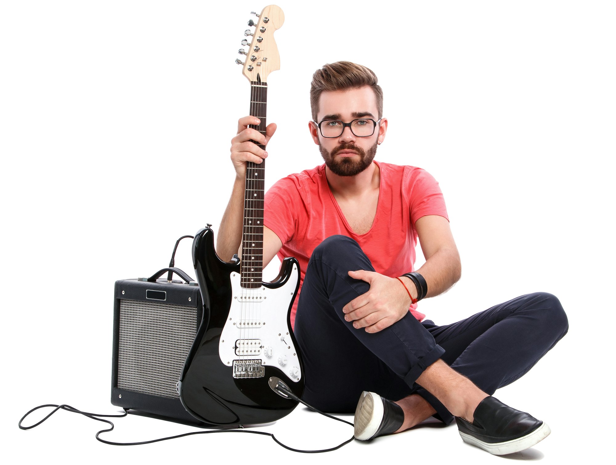 Guy with a guitar on white background