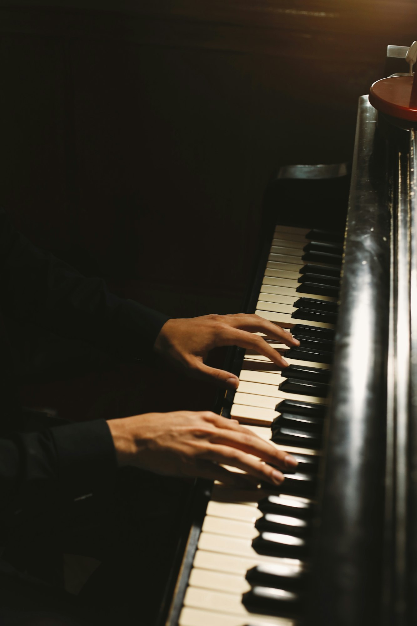 hands and piano keys