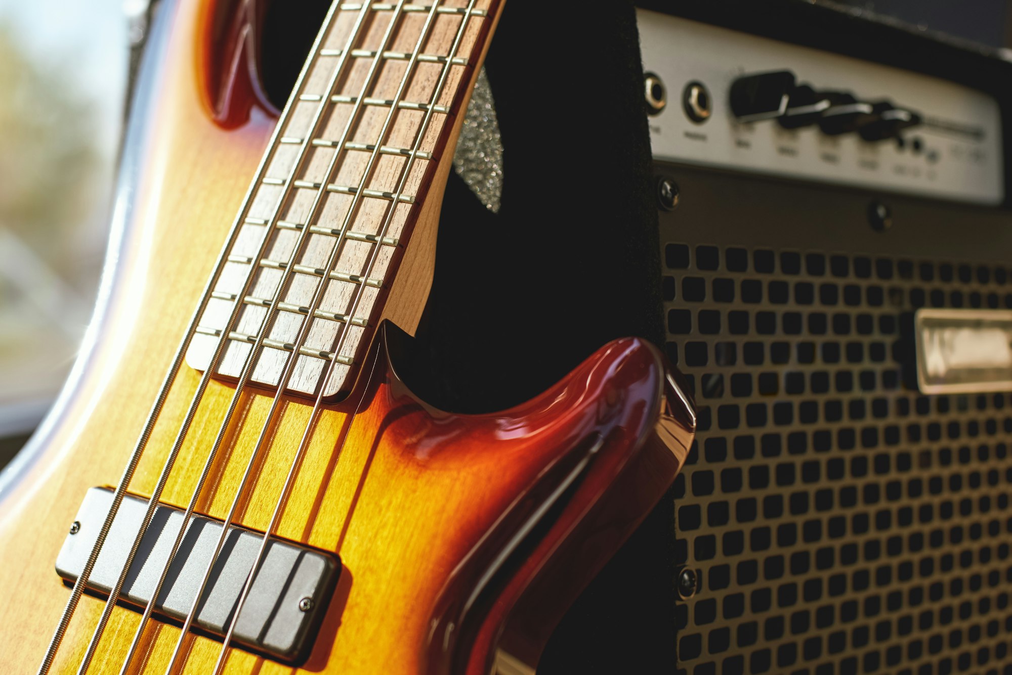 Playing Guitar. Close up view of brown electric guitar and amplifier