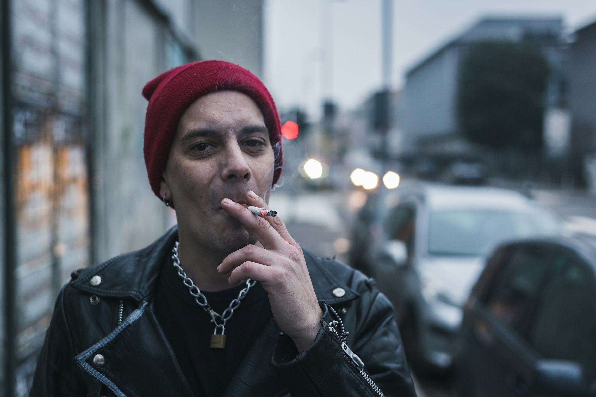 Punk guy posing in the city streets